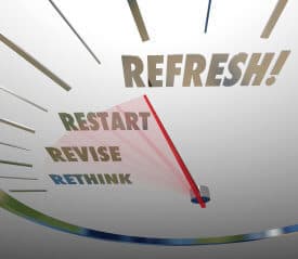 Refresh, Revise, Restart and Rethink words on white speedometer